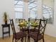 Breakfast nook with table and four chairs at 573 Viola Dr, Davenport, FL 33837