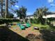 Spacious backyard with seating area and fire pit at 1536 Espanola Ave, Holly Hill, FL 32117