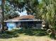 Single story home with mature trees and landscaping at 1536 Espanola Ave, Holly Hill, FL 32117