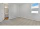 Spacious bedroom with ensuite bathroom and carpet flooring at 4248 Sawtooth Ct, Tavares, FL 32778
