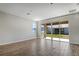 Spacious Gathering room with sliding glass doors leading to the backyard at 4248 Sawtooth Ct, Tavares, FL 32778