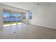 Living area with sliding doors leading to the backyard at 4260 Sawtooth Ct, Tavares, FL 32778