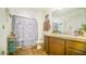 Bathroom with shower and tub, seashell theme at 350 Madison Dr, Davenport, FL 33837