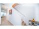 Modern staircase with light walls and wood flooring at 350 Madison Dr, Davenport, FL 33837