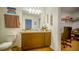 Relaxing bathroom with vanity and access to closet at 350 Madison Dr, Davenport, FL 33837