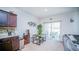 Small dining area with a table and chairs near sliding door at 350 Madison Dr, Davenport, FL 33837