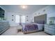 Main bedroom with upholstered headboard and matching furniture at 350 Madison Dr, Davenport, FL 33837