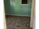 Empty bedroom with teal walls and tile flooring at 101 Albert St, Winter Springs, FL 32708
