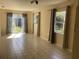 Bright living room with tile floors and sliding glass doors leading to backyard at 101 Albert St, Winter Springs, FL 32708