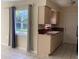 Bright kitchen with gray countertops and a window at 101 Albert St, Winter Springs, FL 32708