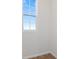 Laundry room with tile flooring and window at 6333 Clover St, Lake Hamilton, FL 33851