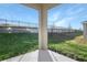 Covered patio with view of grassy backyard at 6333 Clover St, Lake Hamilton, FL 33851