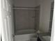 Clean bathroom with tub, toilet and granite vanity at 2757 Creekmore Ct, Kissimmee, FL 34746