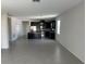 Open concept living room with a view into the kitchen and island at 2757 Creekmore Ct, Kissimmee, FL 34746