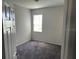 Bright bedroom with carpet and window coverings at 2757 Creekmore Ct, Kissimmee, FL 34746