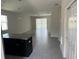 Spacious living room with tile floors and an open floor plan at 2757 Creekmore Ct, Kissimmee, FL 34746