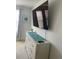 Bedroom featuring a large dresser and wall-mounted TV at 793 Benoi Dr, Davenport, FL 33896