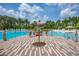 Pool area with a fun, tropical theme at 793 Benoi Dr, Davenport, FL 33896