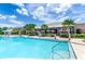 Relaxing pool area adjacent to a restaurant at 793 Benoi Dr, Davenport, FL 33896