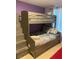 Bedroom with built-in bunk beds and ample storage at 793 Benoi Dr, Davenport, FL 33896