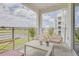 Private balcony with seating area and scenic views at 3121 Paradox Circle 207 # 207, Kissimmee, FL 34746