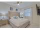 Main bedroom with king-size bed, plush headboard, and plenty of natural light at 3121 Paradox Circle 207 # 207, Kissimmee, FL 34746
