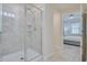 Large walk in shower with modern gray tile at 3121 Paradox Circle 207 # 207, Kissimmee, FL 34746