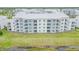 Aerial of apartment building near a lake at 3121 Paradox Circle 207 # 207, Kissimmee, FL 34746
