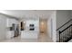 Modern kitchen with white cabinets and a large island at 2391 Beacon Park Landing Cir, Orlando, FL 32824
