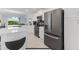 Modern kitchen with stainless steel appliances and island at 3191 Paradox Cir # 205, Kissimmee, FL 34746