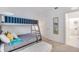 Bedroom with bunk beds and built-in storage at 3191 Paradox Cir # 205, Kissimmee, FL 34746