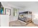 Bright bedroom featuring a bunk bed and window at 3191 Paradox Cir # 205, Kissimmee, FL 34746