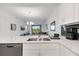 Modern kitchen with stainless steel appliances and island at 3191 Paradox Cir # 205, Kissimmee, FL 34746