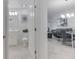 Small bathroom with toilet and vanity, near living area at 3191 Paradox Cir # 205, Kissimmee, FL 34746