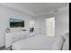 Comfortable bedroom with dresser and view into living area at 3191 Paradox Cir # 205, Kissimmee, FL 34746