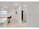 Clean hallway with access to bedrooms and kitchen at 3191 Paradox Cir # 205, Kissimmee, FL 34746