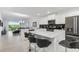 Modern kitchen with island, stainless steel appliances, and white cabinets at 3191 Paradox Cir # 205, Kissimmee, FL 34746