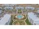 Community view showcasing apartment buildings, pool, and parking at 3191 Paradox Cir # 205, Kissimmee, FL 34746