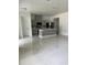 Modern kitchen with stainless steel appliances and an island at 1730 Old Apopka Rd, Apopka, FL 32703