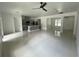 Open concept living room and kitchen with tile floors at 1730 Old Apopka Rd, Apopka, FL 32703