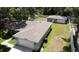 New construction home with a detached garage and fenced backyard at 1730 Old Apopka Rd, Apopka, FL 32703