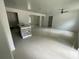 Bright and spacious living room with tile flooring at 1730 Old Apopka Rd, Apopka, FL 32703