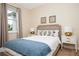 Cozy bedroom with plush bedding and modern nightstands at 301 Captiva Dr, Davenport, FL 33896