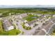 Aerial view of townhome community near a lake at 301 Captiva Dr, Davenport, FL 33896