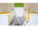 Bright bedroom with twin bunk beds, yellow bedding, and Minion decor at 301 Captiva Dr, Davenport, FL 33896