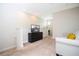 Common area with a couch, TV, and upper level view at 301 Captiva Dr, Davenport, FL 33896