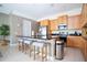 Modern kitchen with stainless steel appliances and island at 301 Captiva Dr, Davenport, FL 33896