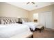 Bedroom with two twin-size beds, and a ceiling fan at 301 Captiva Dr, Davenport, FL 33896