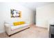 Common area with a couch and a view down a hallway at 301 Captiva Dr, Davenport, FL 33896