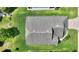 Top-down view of a house with gray roof and surrounding landscape at 114 Ridge View Dr, Davenport, FL 33837